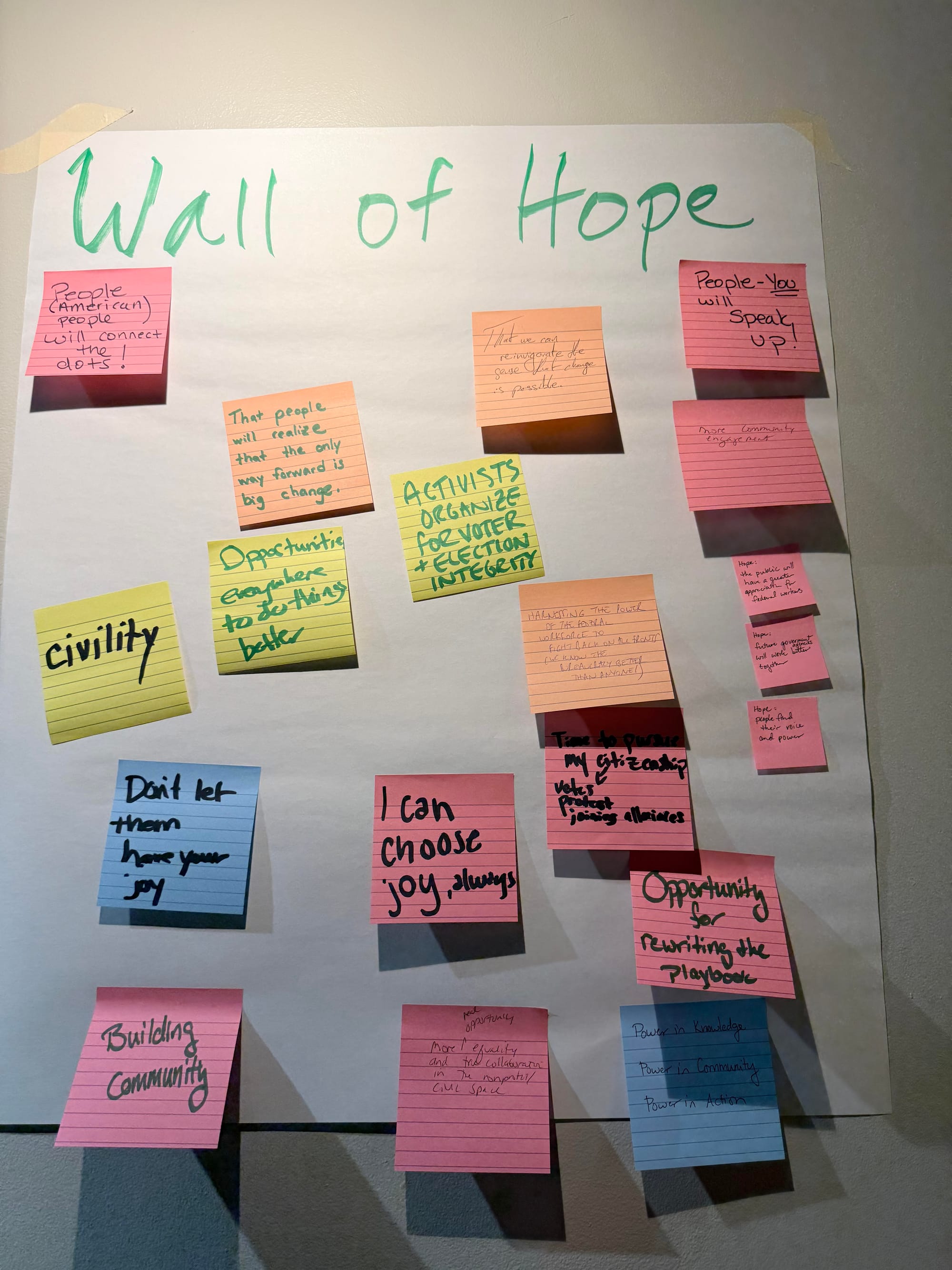 Sticky notes with messages of hope, civility, joy, and more on the "Wall of Hope."